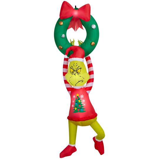 6.5ft. Airblown® Dr. Seuss™ Inflatable Grinch Hanging from Wreath with Red Bow Christmas Light Décor